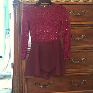 Mauve kids dress that has built in shorts, gold zipper, long sleeve